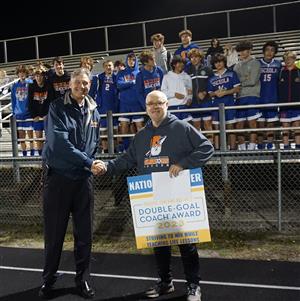 Coach Matthews and Principal Bohnet
